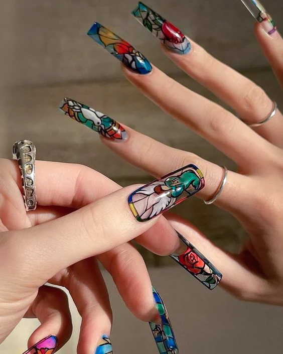 close up of two womans hands with Stained Glass Nails