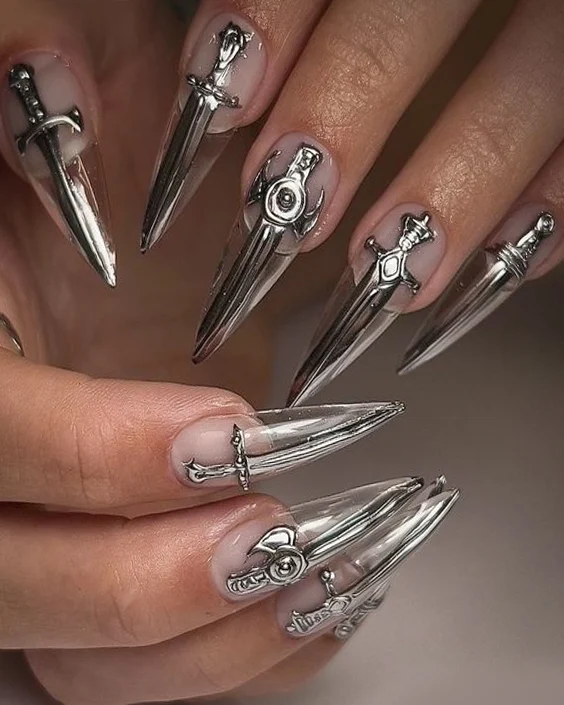 close up of two womans hands with  Joan of Arc Nail Look for Orléans' Goths design