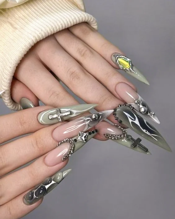 close up of two womans hands with Nephrite and Silver Goth look